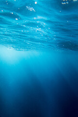 Blue water with sunbeam