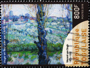 Rural landscape by Vincent Van Gogh on postage stamp
