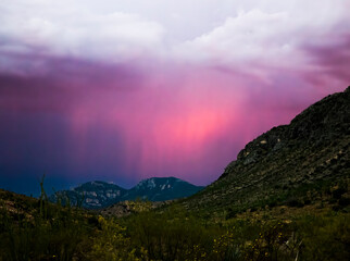 Rain Bands Lit Pink with Sunset Light in Arizona Landscape