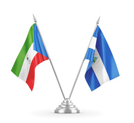 Nicaragua and Equatorial Guinea table flags isolated on white 3D rendering