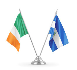 Nicaragua and Ireland table flags isolated on white 3D rendering