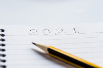 2021 goals write down on notepad as tracker