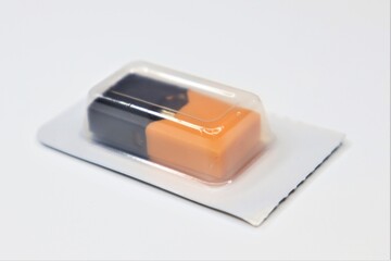 Juul mango cartridge in blister. Nicotine substitute. Instead of cigarettes.