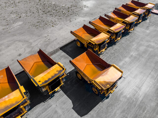 Company strike and bankruptcy mining industry. Parking with big yellow truck for coal, iron ore and...