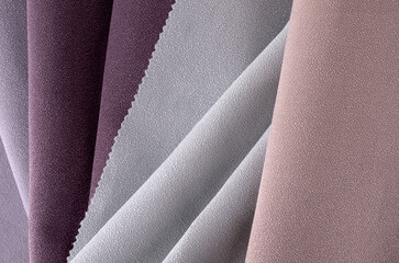 Light Lilac and Pink colors velour textile samples.. Fabric texture background