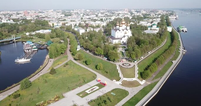 Scenic view from drone of Yaroslavl with park at Strelka in place of confluence of Kotorosl and Volga rivers and Assumption cathedral, Russia