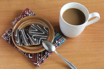 cup of coffee and cookies