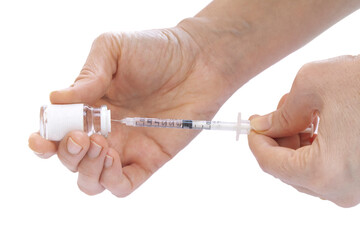 Female doctor with a stethoscope on shoulder holding syringe and COVID-19 vaccine. Healthcare And Medical concept.
Close-up medical syringe with a vaccine.
