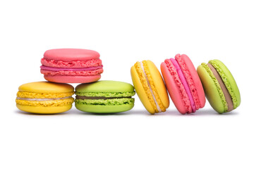 Yellow, pink and green macaron cookies isolated on white background