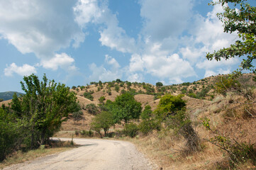 Landscape with mountains and a road in Crimea on a sunny day