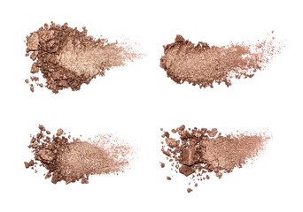Set of eyeshadow sample isolated on white background. Crushed brown metallic eyeshadow. Closeup of a makeup product.