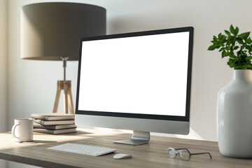Minimalistic desktop with glowing computer screen