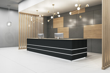 Luxury office lobby with black reception desk and two computers. - obrazy, fototapety, plakaty