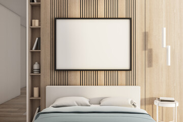 Bedroom interior with blank poster on wall