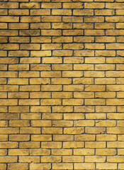 trendy yellow color dirty brick wall grunge back street ghetto district urban background textured surface vertical picture concept with empty copy space for your text here