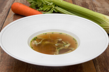 Beef consommé with pancake julienne