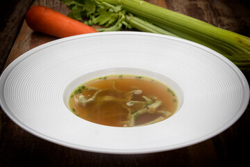 Beef consommé with pancake julienne