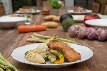 Mixed seasonal vegetable plate with parsley potatoes