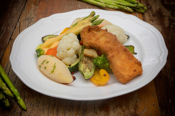 Mixed seasonal vegetable plate with parsley potatoes