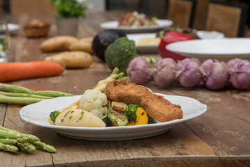 Mixed seasonal vegetable plate with parsley potatoes