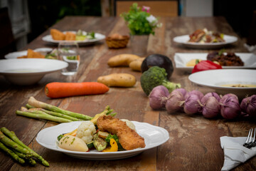 Mixed seasonal vegetable plate with parsley potatoes