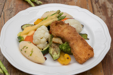 Mixed seasonal vegetable plate with parsley potatoes