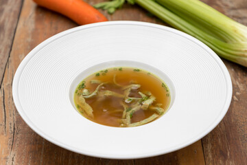 Beef consommé with pancake julienne