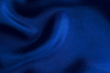 soft silk folds blue color - close up, decor and natural textured fabric background
