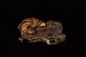 Single croissant on a plate