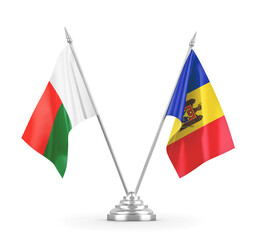 Moldova and Madagascar table flags isolated on white 3D rendering