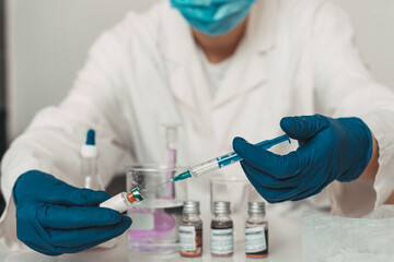 experimenting with different vaccines in laboratory, cure for covid-19