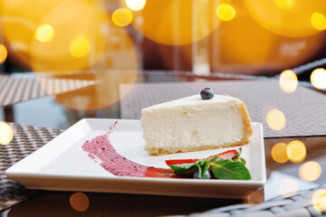 A piece of white cake on a plate