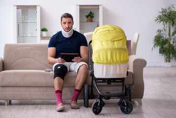 Young injured man looking after newborn in unrequited love