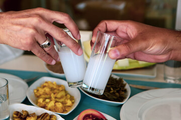 Turkish and Greek Traditional Dinning Table with Special Alcohol Drink Raki. Ouzo and Turkish Raki...