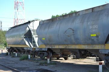 Fototapeta na wymiar Abandoned clinker freight train