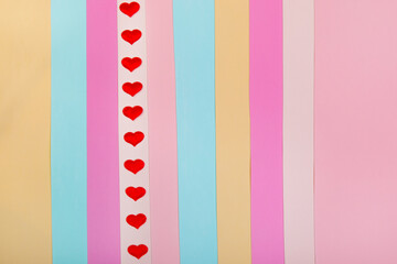 Multicolored background with a red heart.