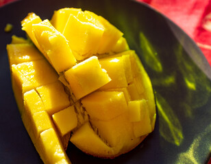 close view of pre-cut mango ready to eat - Powered by Adobe