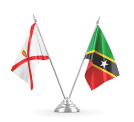 Saint Kitts and Nevis and Jersey table flags isolated on white 3D rendering
