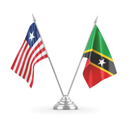 Saint Kitts and Nevis and Liberia table flags isolated on white 3D rendering