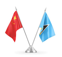 Saint Lucia and China table flags isolated on white 3D rendering