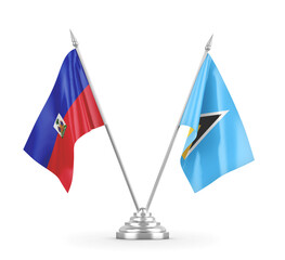 Saint Lucia and Haiti table flags isolated on white 3D rendering
