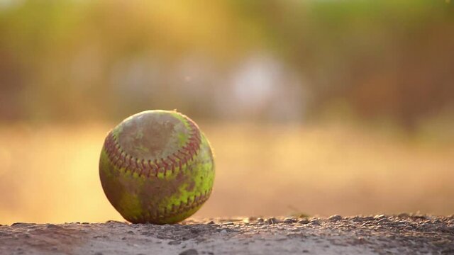 Baseball ball with the practice of a male baseball player