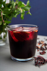 Jamaica water with dried flowers and mint also called Hibiscus tea