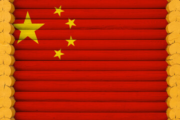 National flag  of China on a wooden wall background. The concept of national pride and a symbol of the country. Flags painted on a house