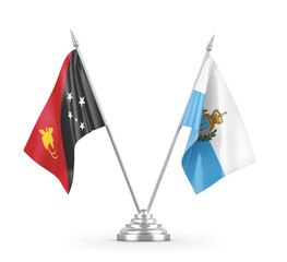 San Marino and Papua New Guinea table flags isolated on white 3D rendering