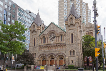 Fototapeta na wymiar TORONTO, CANADA - JUNE 18, 2017: Exterior view of St. Andrew church, a large and historic Romanesque Revival Presbyterian church in downtown Toronto, Ontario. 