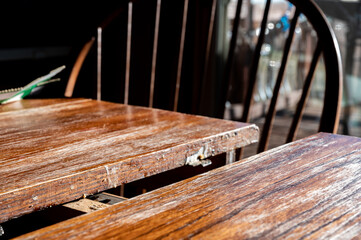 Fototapeta premium Selective focus on mechanism and gap for adding an additional leaf to an expandable kitchen table