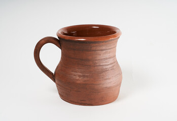 Pottery Craft, ceramic product with your own hands, made on a Potter's wheel, isolated on a white background.