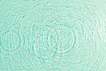 Fototapeta premium texture of splashing water on pastel background