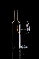 Still life with glass objects on a black background